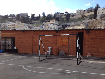 Sports field prior to the demolition (Photo: MECA) 
